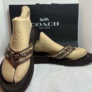 Coach women’s Tan and Brown signature C Flip-Flops